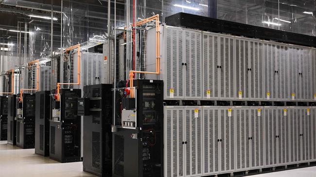 Rows of cabinets containing lithium ion batteries.