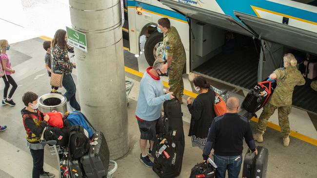 29-06-2021 Covid Hotspots, Return passengers at Brisbane International airport arriving from Papua New Guinea are processed and about to go into hotel quarantine. PICTURE: Brad Fleet.