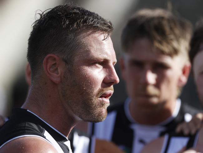 Glenorchy coach Josh Arnold speaking to the playing group at 3/4 time. Picture: Nikki Davis-Jones