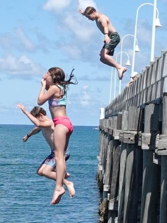 Siblings Rishayni, Ezra and Seth Butterman are cleared for takeoff. Picture: Chris Knight