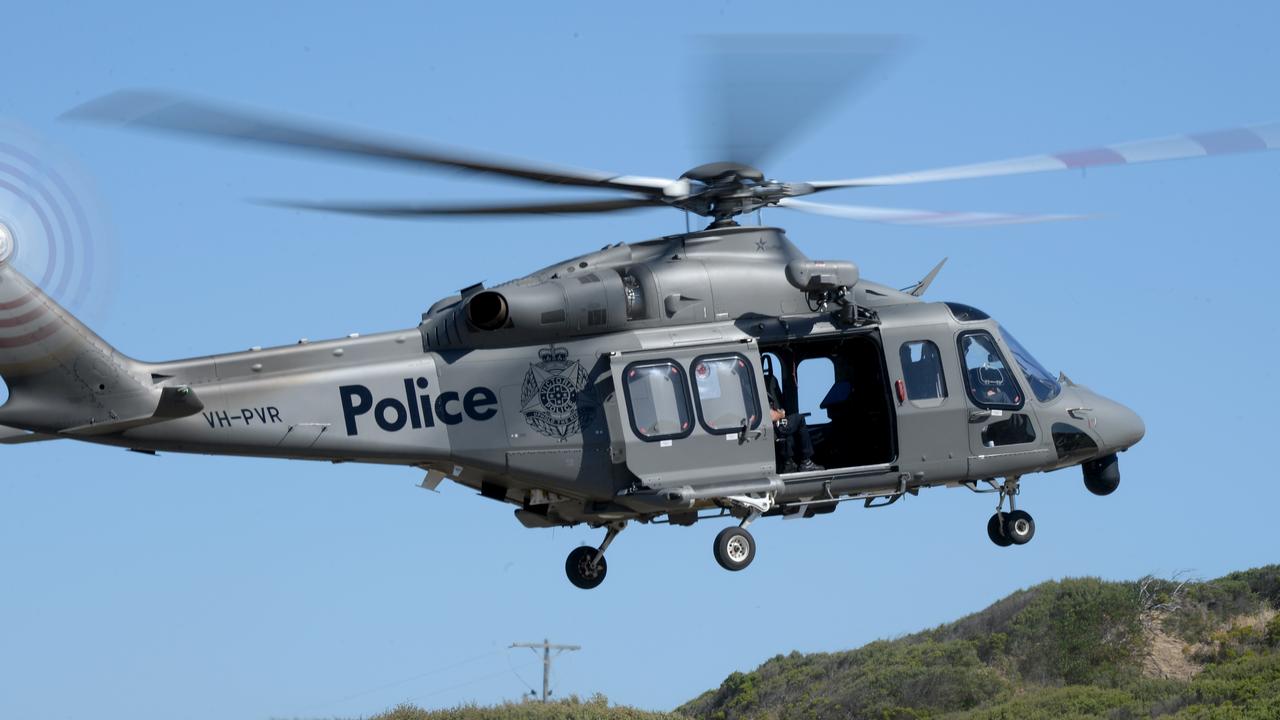 Emergency services search for a missing swimmer at Gunnamatta surf beach. Picture: Andrew Henshaw