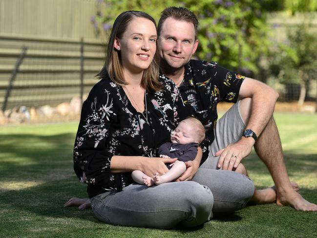 Parents Rhett and Shahn Trevarthen with baby William who was born with a hole in his heart and had open heart surgery at 2 weeks old. The family returned to Townsville from Brisbane 2 weeks ago. PICTURE: MATT TAYLOR.