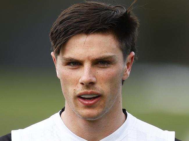 MELBOURNE, AUSTRALIA - SEPTEMBER 13: Oliver Henry of the Magpies looks on during a Collingwood Magpies AFL training session at Olympic Park Oval on September 13, 2022 in Melbourne, Australia. (Photo by Daniel Pockett/Getty Images)