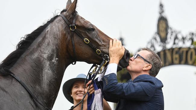 Trainer David Vandyke kisses Alligator Blood after victory in race 5, the Cs Hayes Stakes, during Black Caviar the Great Horse Race Day at Flemington Racecourse on February 15 this year. Picture: AAP