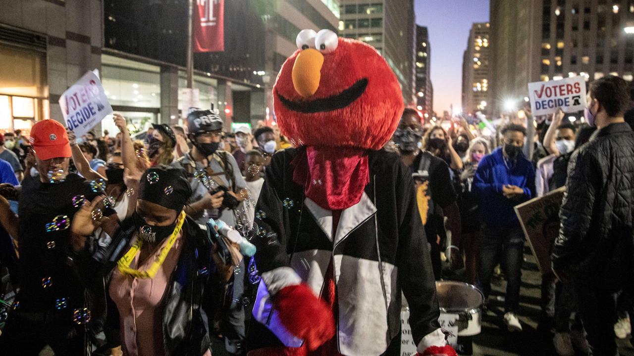 People celebrate in the streets after Joe Biden was declared winner of the 2020 presidential election. Picture: Chris McGrath/Getty Images/AFP