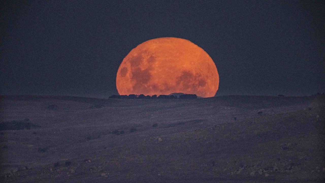 A supermoon rising over Lake George. Picture: NewsWire / Gary Ramage