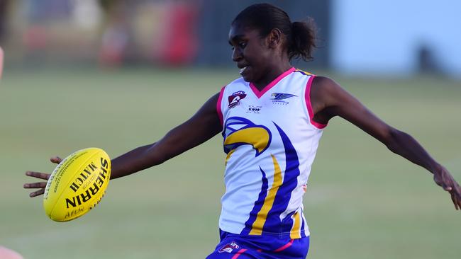 Delma Gisu in action in the North Queensland women's AFL championships.