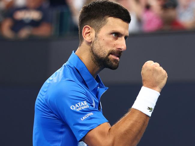 BRISBANE, AUSTRALIA - JANUARY 01: Novak Djokovic celebrates a point in the Men's Doubles match partnered with Nick Kyrgios against Michael Venus and Nikola Mektic during day four of the 2025 Brisbane International at Pat Rafter Arena on January 01, 2025 in Brisbane, Australia. (Photo by Chris Hyde/Getty Images)