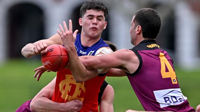 VAFA: Fitzroy’s Lewis Johnston gets stopped by Old Haileybury’s Sam Algeri. Picture: Andy Brownbill