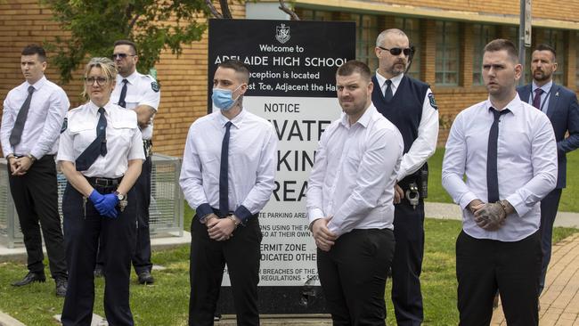 The four accused men - (from left) Thomas Pennington, Kain Mazomenos, Jeremy Dale Sandell and Thomas Nichols - stand with guards at Adelaide High School during the trial proceedings on Tuesday. Picture: NCA NewsWire