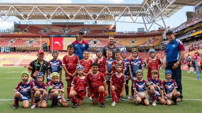 Coaches Scott Walsh and Paul Eakin with the Roma Saints Junior Under 8s team for their match ahead of the Dolphins inaugural game at Suncorp Stadium. Picture: Dolphins Rugby League.