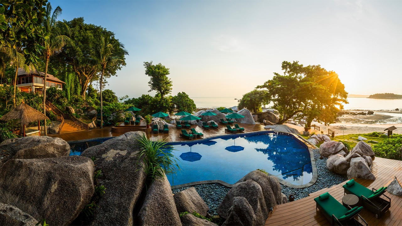 '<h3>The hot spot: Bintan Island</h3>
<p>It may be part of Indonesia, but Bintan Island is only about a one-hour ferry hop from Singapore and has beautiful beaches, temples, resorts and golf courses.</p>
<p><strong>Where to stay:</strong> The <a href='https://travel.escape.com.au/accommodation/detail/banyan-tree-bintan?HotelCode=0376449' target='_blank' rel='noopener'>Banyan Tree Bintan</a> is an all-pool-villa luxury resort with a private beach, infinity pools, spa, kids club and 18-hole golf course.</p>
<p><strong>Temple time:</strong> See more than 500 life-sized individual stone statues, including Tripitaka from Journey to the West, at the slightly surreal 500 Lohan Temple, Vihara Ksitigarbha Bodhisattva.</p>
<p><strong>Tip:</strong> Pack light for the hot and humid weather, but always carry a scarf for blasts of airconditioning in taxis and shops.</p>'