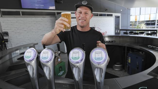 Mick Fanning cheers the CUB-Balter deal in Brisbane Picture: Mark Cranitch.