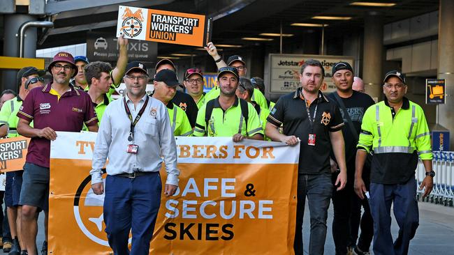 Jetstar staff at the strike out front of the terminal. Jetstar strike at the Brisbane airport. Friday December 13, 2019. (AAP image, John Gass)