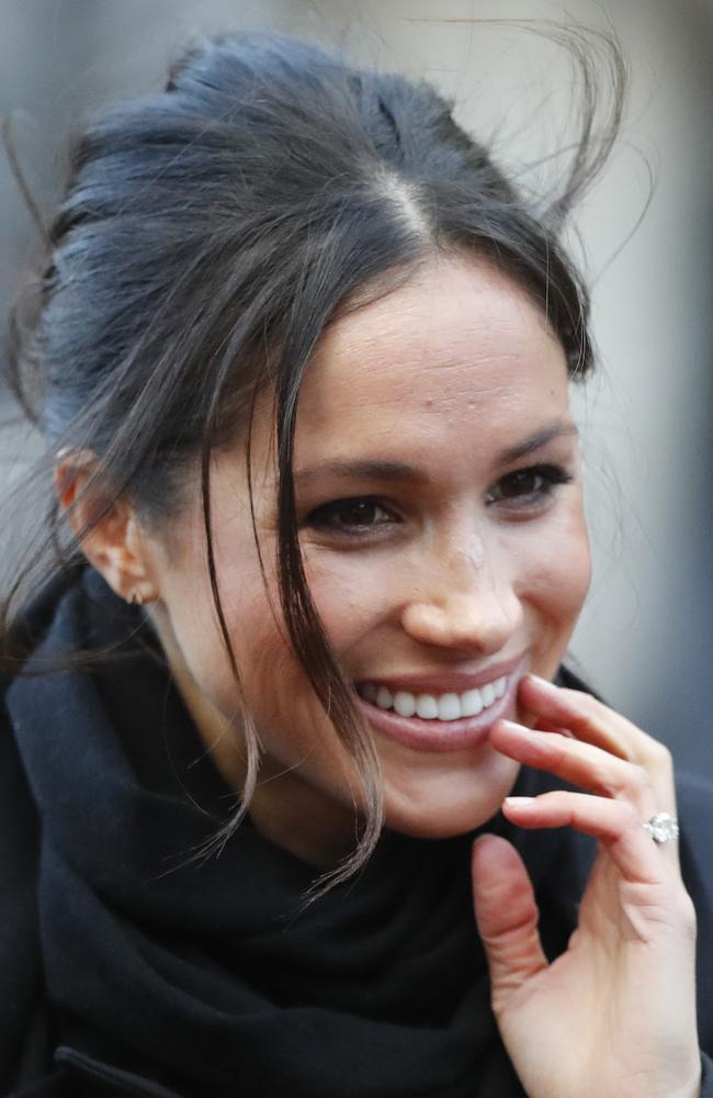 Meghan Markle smiles as she arrives with Prince Harry for a visit to Cardiff Castle in Cardiff, Wales, Thursday, Jan.18, 2018. Picture: AP