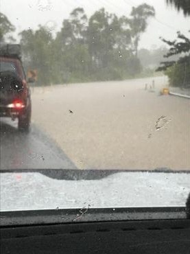 Flash flooding on Moore Park Beach Road.