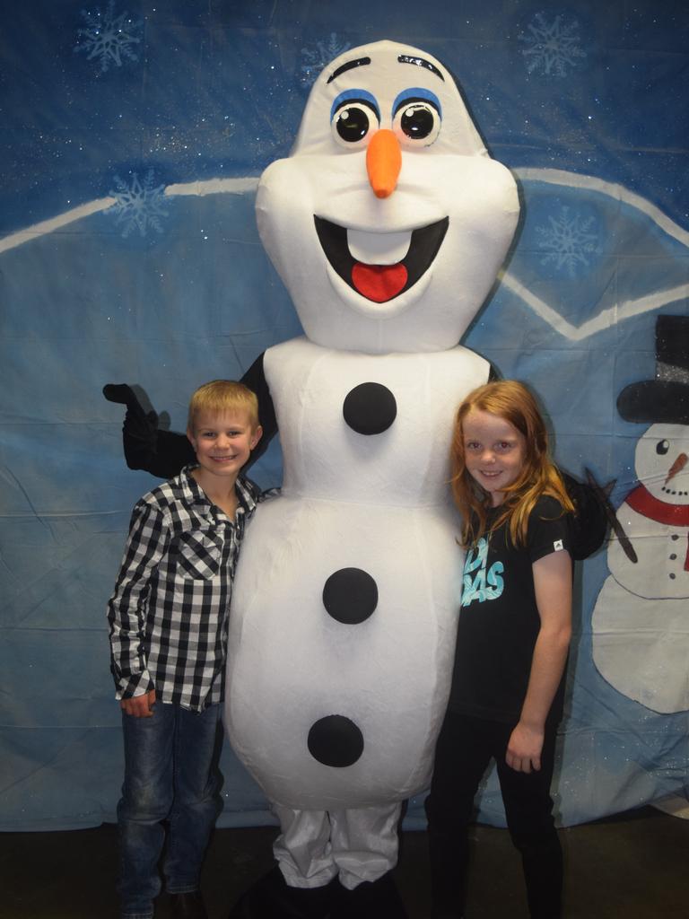 Jack Brown and Shania Politch meet Olaf at the Blue Light Disco. Photo: Alex Nolan / Stanthorpe Border Post