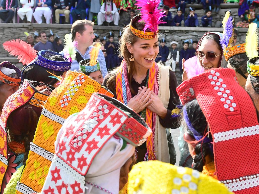 Kate is draped in some colourful local garments. Picture: Samir Hussein — Pool/Getty Images.