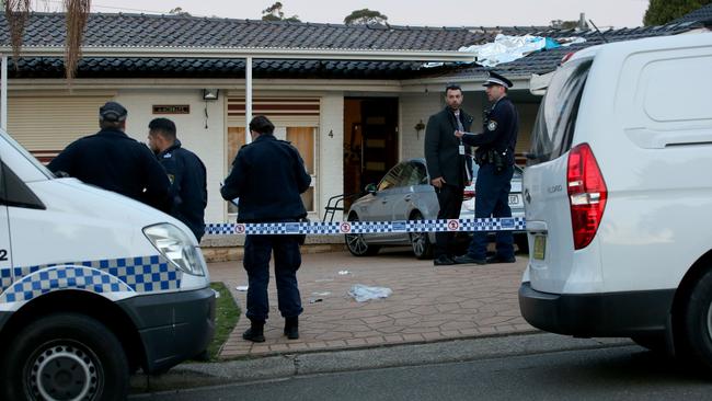 Police at the scene of the tragic near drowning in Casula. Picture: Damian Shaw