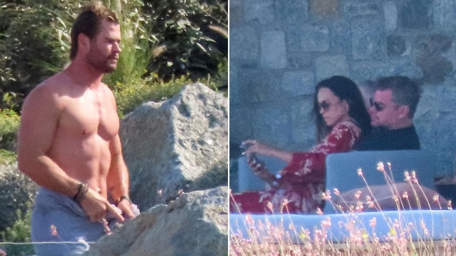 Hollywood stars do Mykonos: Chris Hemsworth, left, spotted shirtless as movie star mate Matt Damon and Luciana Barroso, right, relax. Picture: A LONE WOLF / MEGA