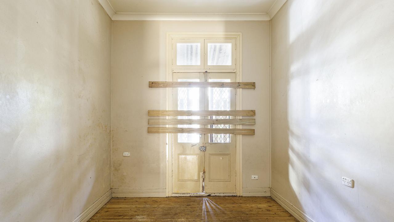 Doors boarded up inside 202 Palmer St, Darlinghurst. Picture: Supplied