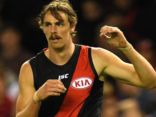 Joe Daniher of the Bombers reacts during the Round 6 AFL match between the Essendon Bombers and the Melbourne Demons at Etihad Stadium in Melbourne, Sunday, April 30, 2017. (AAP Image/Julian Smith) NO ARCHIVING, EDITORIAL USE ONLY