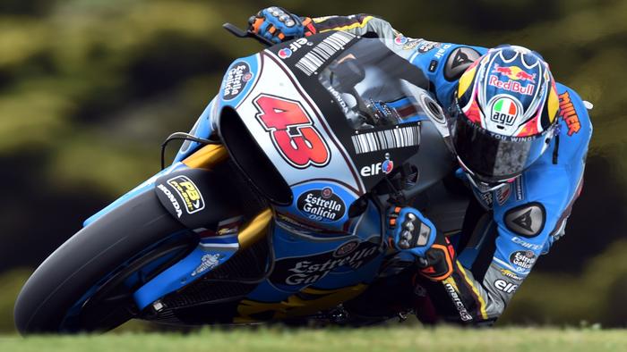 EG 0,0 Marc VDS' rider Jack Miller of Australia powers his machine during the second practice session of the Australian MotoGP Grand Prix at Phillip Island on October 20, 2017. / AFP PHOTO / PAUL CROCK / IMAGE RESTRICTED TO EDITORIAL USE - STRICTLY NO COMMERCIAL USE