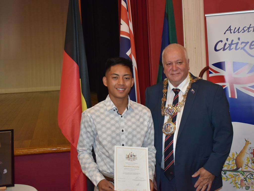 Japhepth Jether Salloman Bascuna congradulated on his citizenship by mayor Vic Pennisi (Photo: Warwick Daily News)