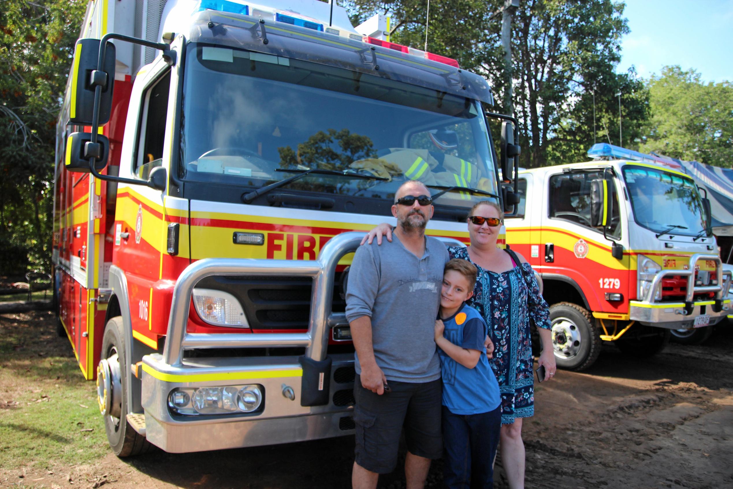 David Floyd, Seth Floyd and Danielle Singleton enjoying the Emergency Services Day at the Heritage Village on Sunday. Picture: Shayla Bulloch