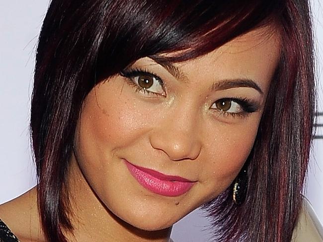 LAS VEGAS, NV - FEBRUARY 07: Mixed martial artist and model Michelle Waterson arrives at the sixth annual Fighters Only World Mixed Martial Arts Awards at The Palazzo Las Vegas on February 7, 2014 in Las Vegas, Nevada. (Photo by David Becker/WireImage)