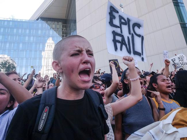 Demonstrators rally outside Los Angeles City Hall to protest the presidential election win President-elect Donald Trump in Los Angeles, California, on November 9, 2016. Picture: AFP