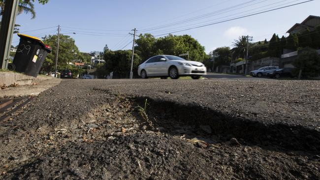 Send photos of the worst potholes in your suburb to news@dailytelegraph.com.au. Picture by Damian Shaw