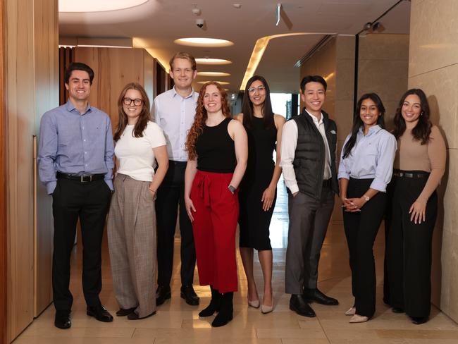 Graduates from Gilbert + Tobin law firm, (L- R) Tate Lindsay, Abbey Stewart, Bodhi Morgan, Hannah Kaine, Annika Drego, Matthew Wu, Abi Vaseeharan and Talia Nardi. Jane Dempster/The Australian.