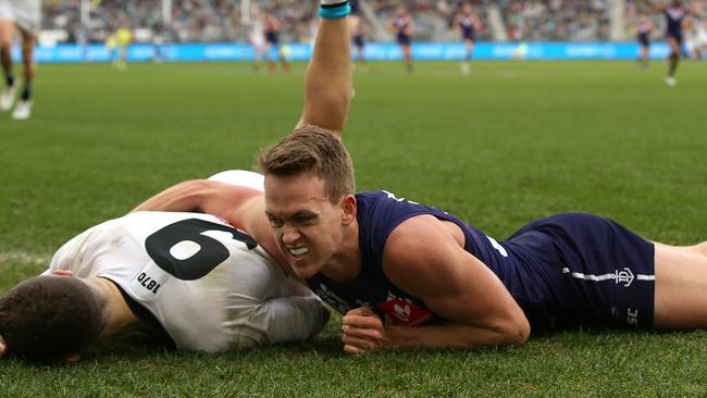 Ryan Nyhuis of the Dockers sling tackles Robbie Gray of the Power. Picture: Paul Kane/Getty Images