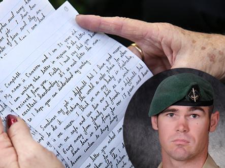 Parents Doug Baird and Kaye Baird (Cameron Baird's parents) and Blacktown student Campbell Byrd with a letter sent to Campbell by commando Cameron Baird VC before he was killed in action in Afghanistan. Photo: Bob Barker.