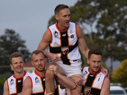 Goodwood's Tom Anderson is chaired off following his 150th game after the Saints defeated Brighton in their season opener. Picture: Mardi Graetz