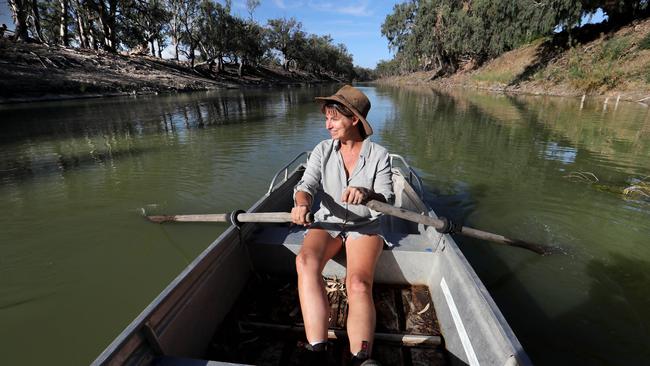 Farmer Rachel Strachan on the Darling River at her property in Pooncarie in February 2018. Picture: David Geraghty