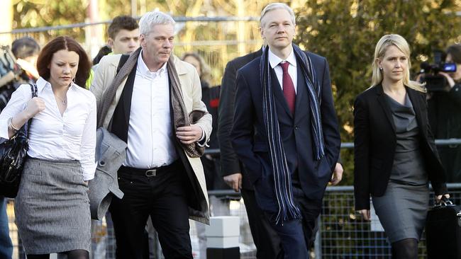 WikiLeaks founder, Julian Assange, second right with his lawyer Jennifer Robinson, right, arrives at Belmarsh Magistrates' Court in London, Tuesday, Feb. 8, 2011. (AP Photo/Alastair Grant)