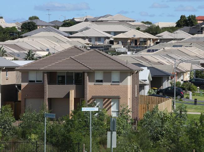 Pictures of the sea of houses at The Rydges in Elderslie as the population spreads south west at a rapid pace.