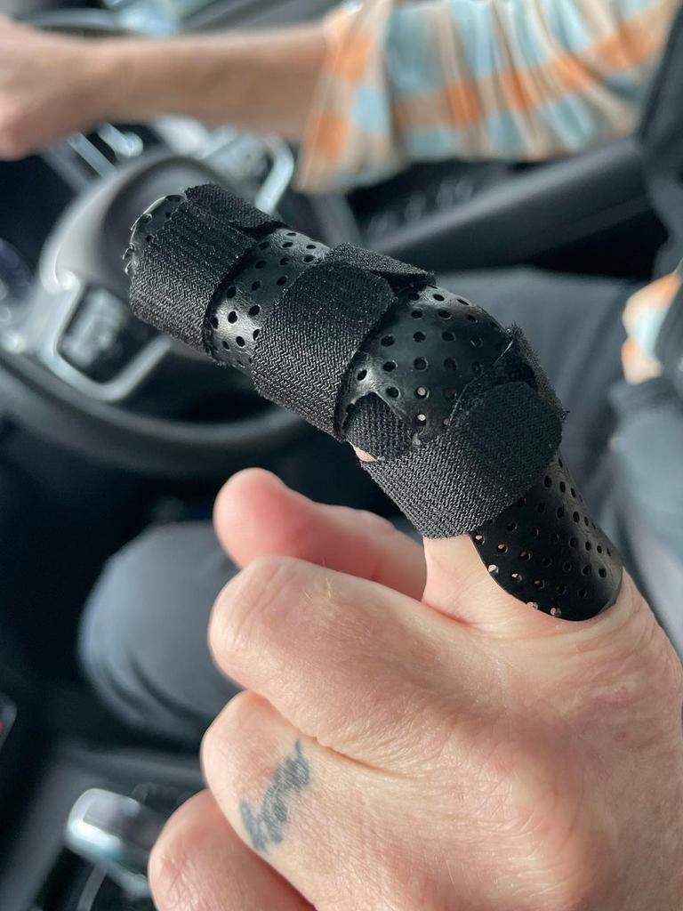 Dave Hughes left with dislocated finger after surprising sock injury |  news.com.au — Australia's leading news site