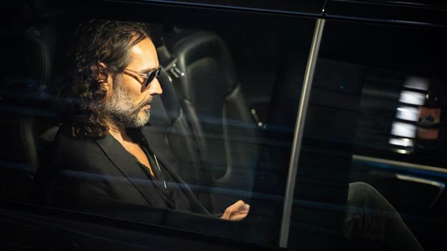 Russell Brand leaves the Troubabour Wembley Park theatre in northwest London after performing a comedy set this week. (Photo by James Manning/PA Images via Getty Images)