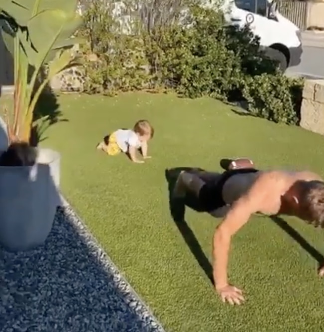 Kookaburra Jake Whetton working out with his new training partner - his toddler Felix. (Instagram)