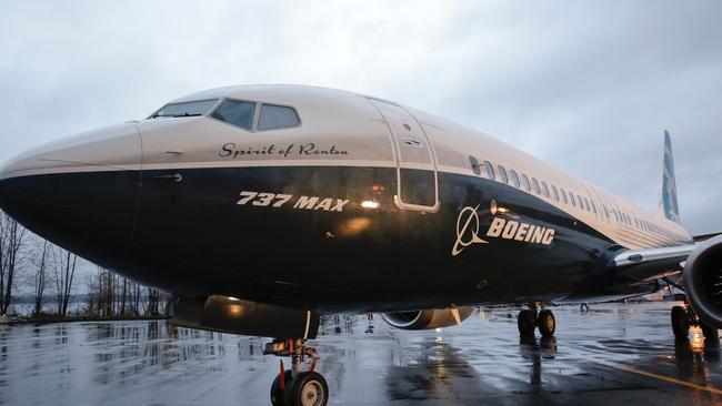 Boeing’s first 737 MAX, named “Spirit of Renton”, parked on the tarmac at the Boeing factory in Renton, Washington in December 2015. American Airlines has ordered four of these planes, which come without backseat monitors. Picture: AFP/Jason Redmond