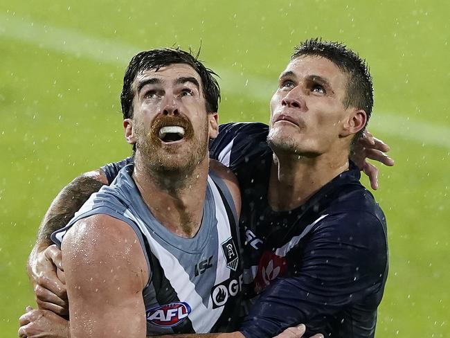 The Power’s Scott Lycett in action against Fremantle’s Rory Lobb during Port’s win at Metricon Stadium on the Gold Coast. Picture: AAP IMAGE/DAVE HUNT