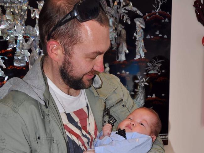 Bourke St rescuer Marc Richardson with the baby boy born to the woman he helped during the tragedy.