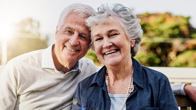 Shot of a happy senior couple relaxing together outdoors; retirees, seniors generic