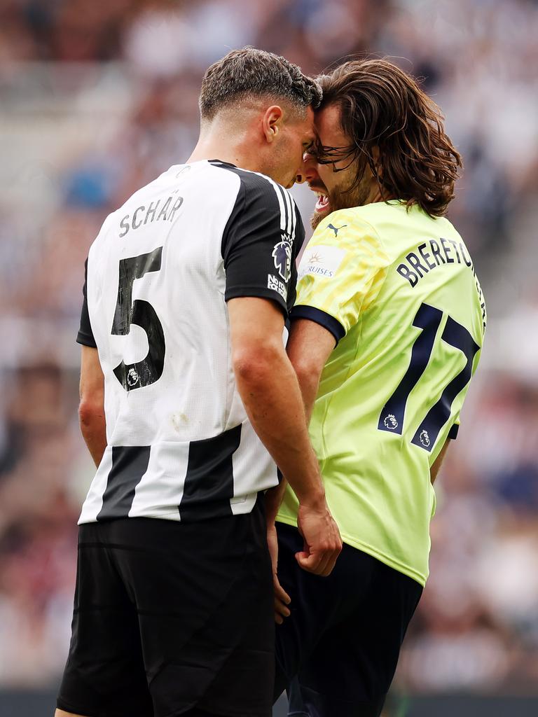 Schaer and Diaz bump heads. (Photo by Ian MacNicol/Getty Images)