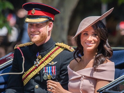 COMP IMAGE - DO NOT USE LONDON, ENGLAND - JUNE 09:  Prince Harry, Duke of Sussex and Meghan, Duchess of Sussex ride by carriage during Trooping The Colour 2018 on the Mall on June 9, 2018 in London, England.  (Photo by Samir Hussein/Samir Hussein/WireImage)