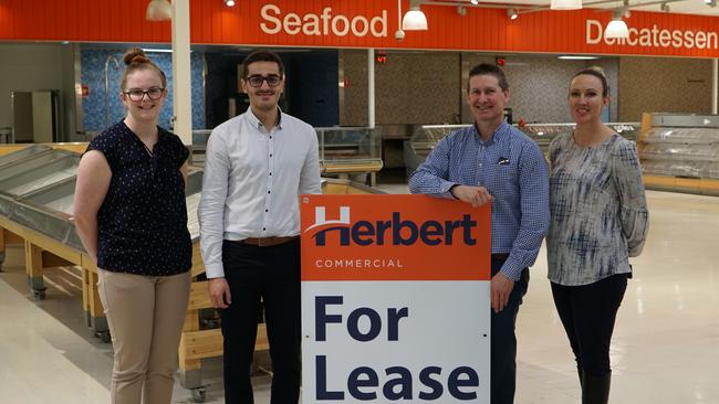 Savills Adelaide retail leasing executive Frank Noto (second) with Matt Kain, Lauren Smith and Shae Landon from Herbert Commercial at the former Mount Gambier Coles site. Picture: Jessica Ball