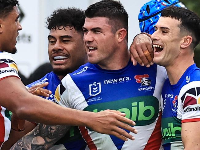 TAMWORTH, AUSTRALIA - MAY 11: Bradman Best of the Knights celebrates a try with team mates during the round 10 NRL match between Wests Tigers and Newcastle Knights at Scully Park, on May 11, 2024, in Tamworth, Australia. (Photo by Mark Evans/Getty Images)